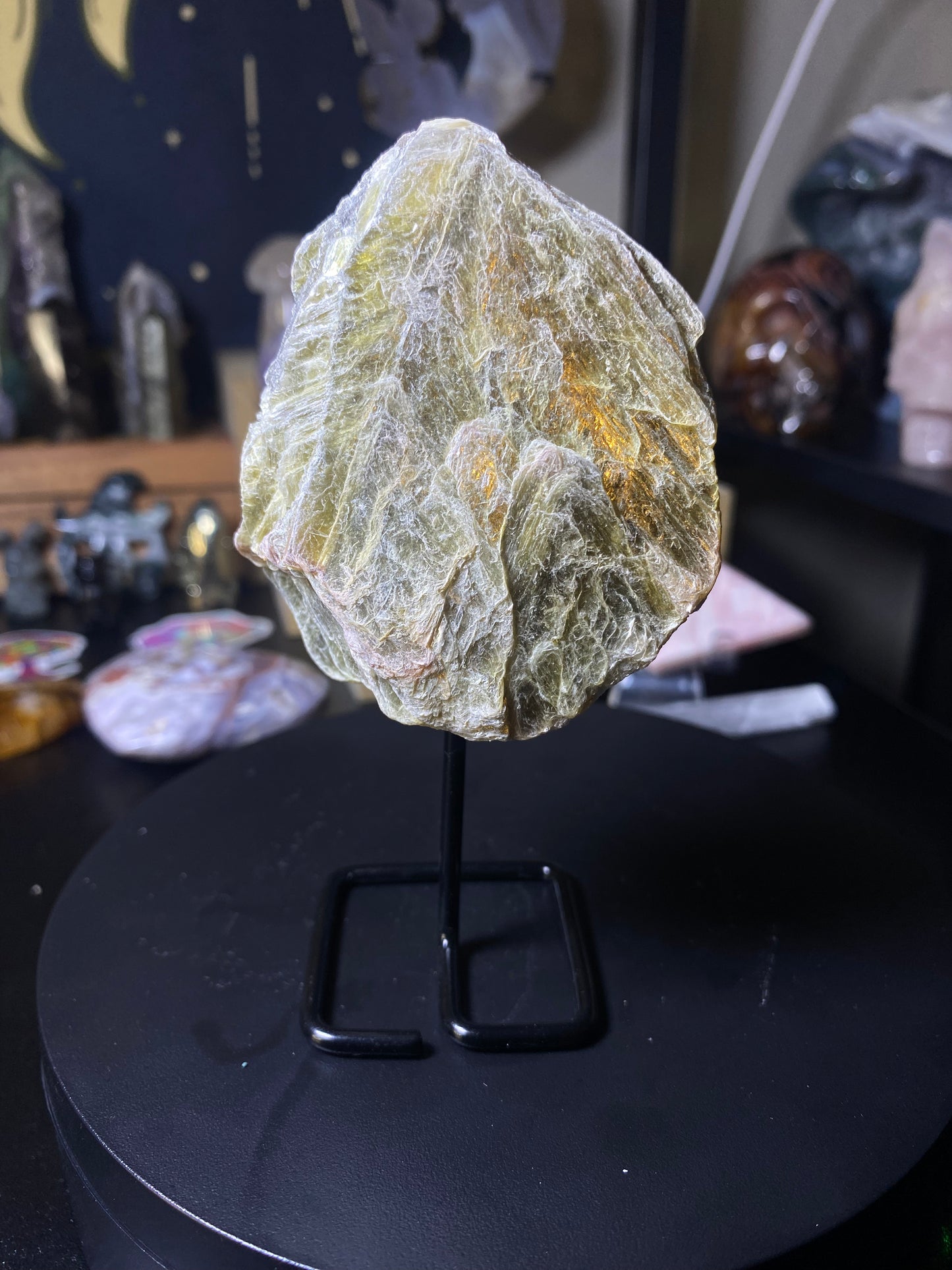 golden mica specimen on a stand 0.25lbs